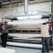 Operator loading Monto Antonio heat press