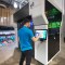 Massivit 1800 operator using touchscreen interface.