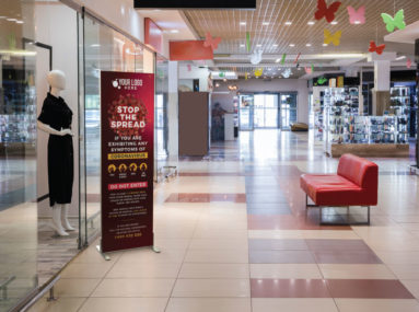 Freestanding coronavirus signage in shopping center