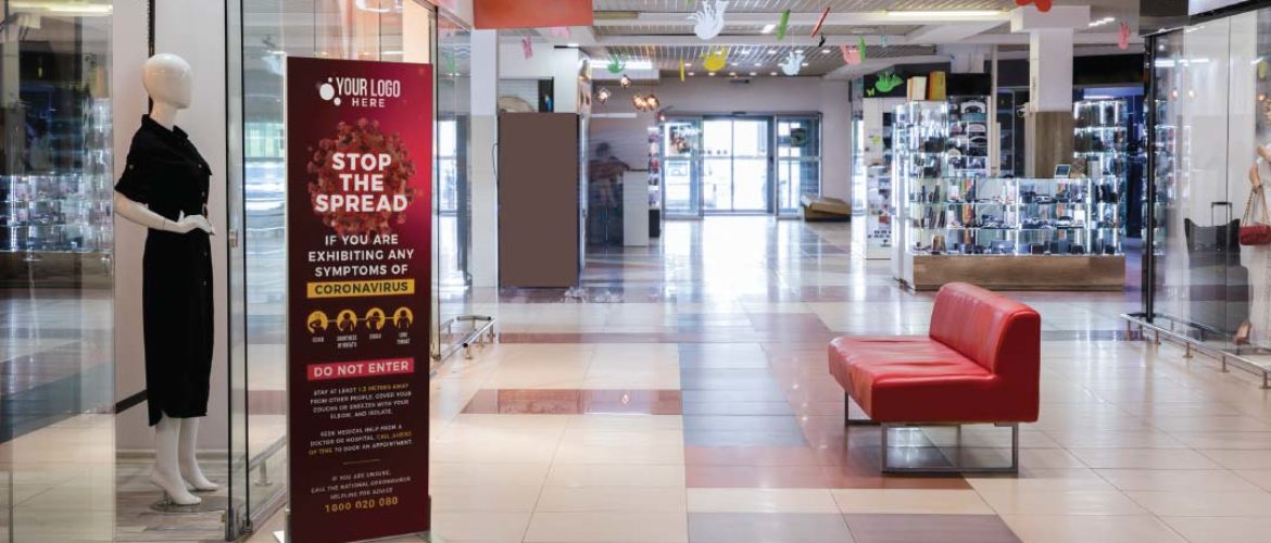 Freestanding COVID-19 signage in a retail environment